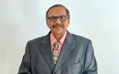 Dr. Ambadi Kumar
