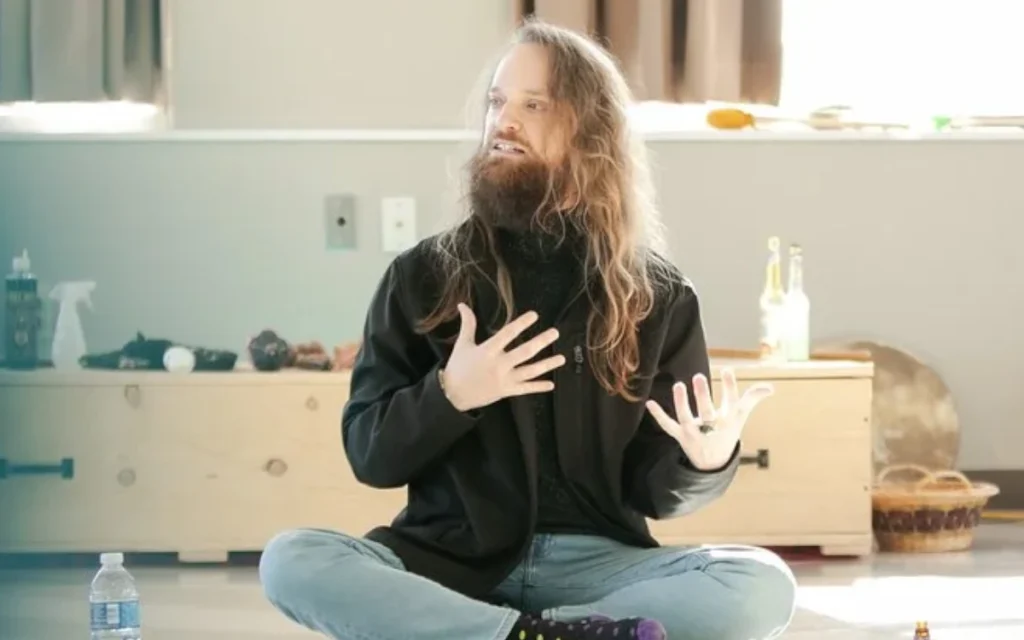 I am Z. Hamilton Avery, LCSW, BC-TMH, CMT, CYT-1,000, TIYT (he/they). My professional path has never followed a particularly straight line. For more than 15 years, my work has crossed bodywork, yoga, meditation, complementary and alternative medicine, behavioral health, healthcare, crisis services, coaching, education, and clinical social work. My interdisciplinary education spans pre-nursing, psychology, and social work.